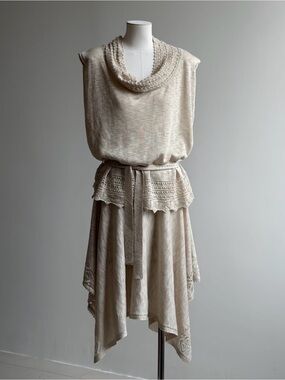 New a beige or light gray sleeveless knit set includes top and skirt, featuring